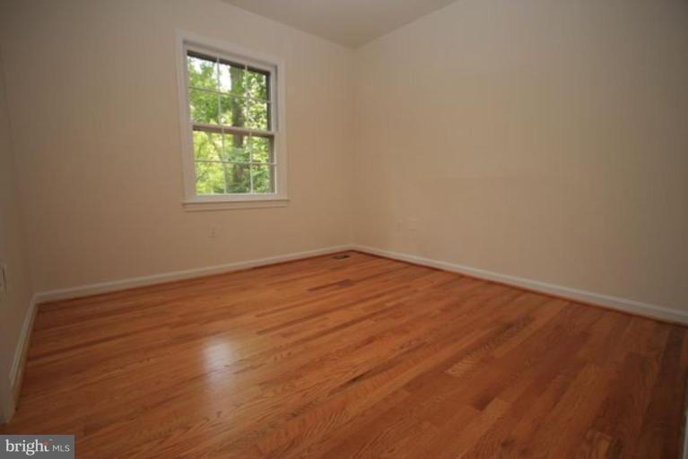 11322 Myrtle Lane Reston, VA 20191 - Photo 12 of 24 an empty room with a window