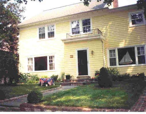 a front view of house with yard