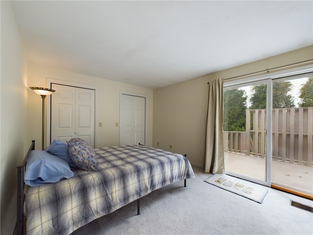 1125 Point Judith Road, Unit E5 Narragansett, RI 02882 - Photo 14 of 27 Sliders out to the private deck