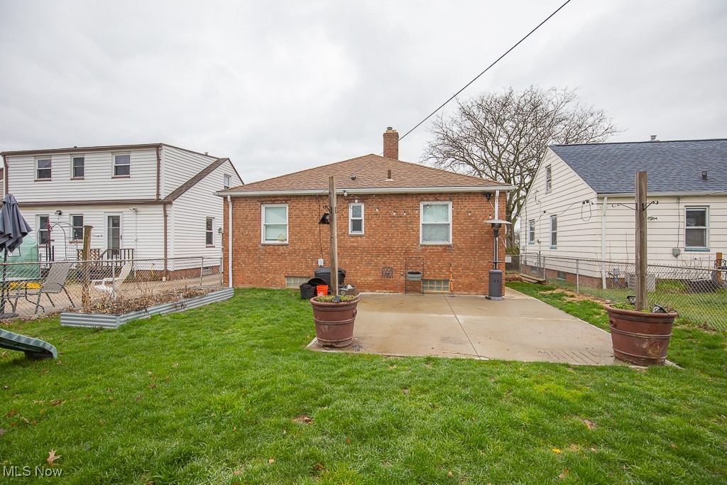 4815 Redfern Road Parma, OH 44134 - Photo 22 of 22 Rear view of property with a patio area, fenced yard
