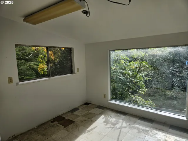 a house with trees in the background