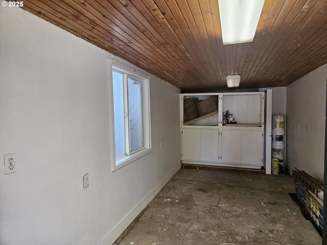 a view of backyard with cabin