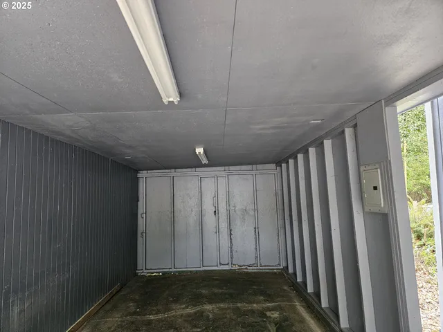 a kitchen with stainless steel appliances a sink stove and refrigerator