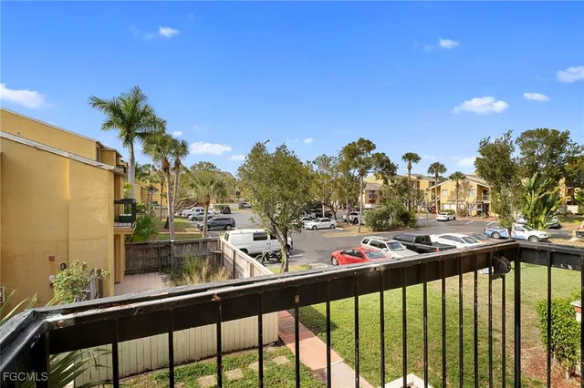 a view of a street from a balcony