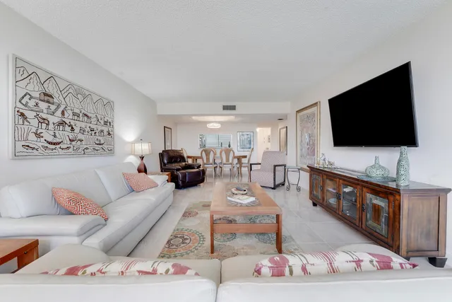 a kitchen with a sink stove and microwave