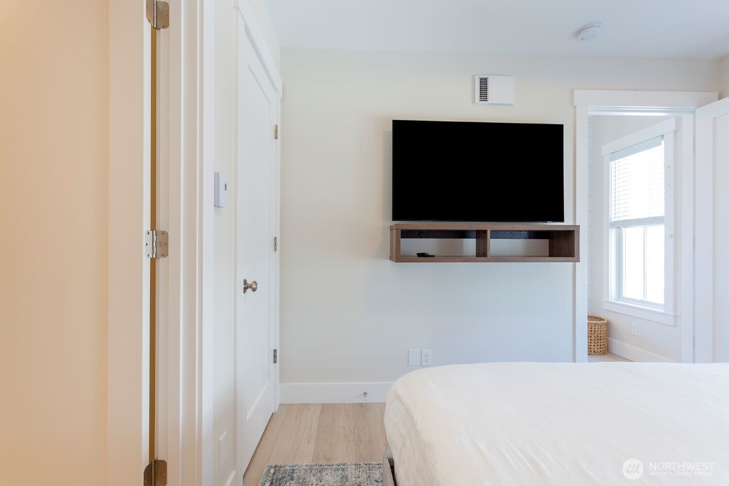 203 Market Street, Unit D Pacific Beach, WA 98571 - Photo 14 of 16 a room with a flat screen tv and a window