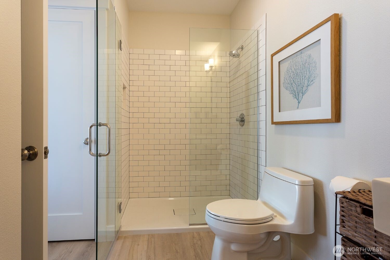 203 Market Street, Unit D Pacific Beach, WA 98571 - Photo 16 of 16 a bathroom with a toilet and shower
