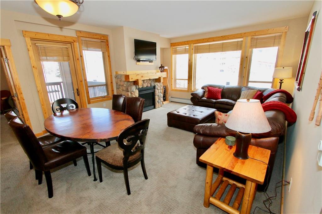 172 Copper Circle, Unit 210 Copper Mountain, CO 80443 - Photo 6 of 25 a living room with furniture and a window
