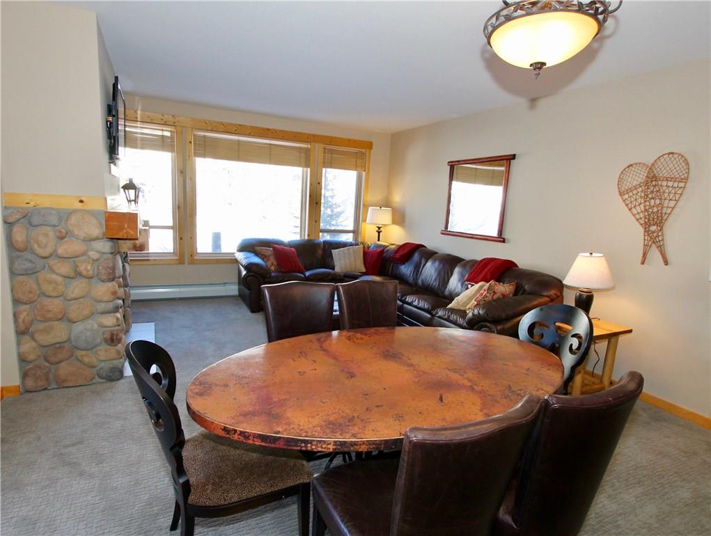 172 Copper Circle, Unit 210 Copper Mountain, CO 80443 - Photo 8 of 25 a living room with furniture and a large window
