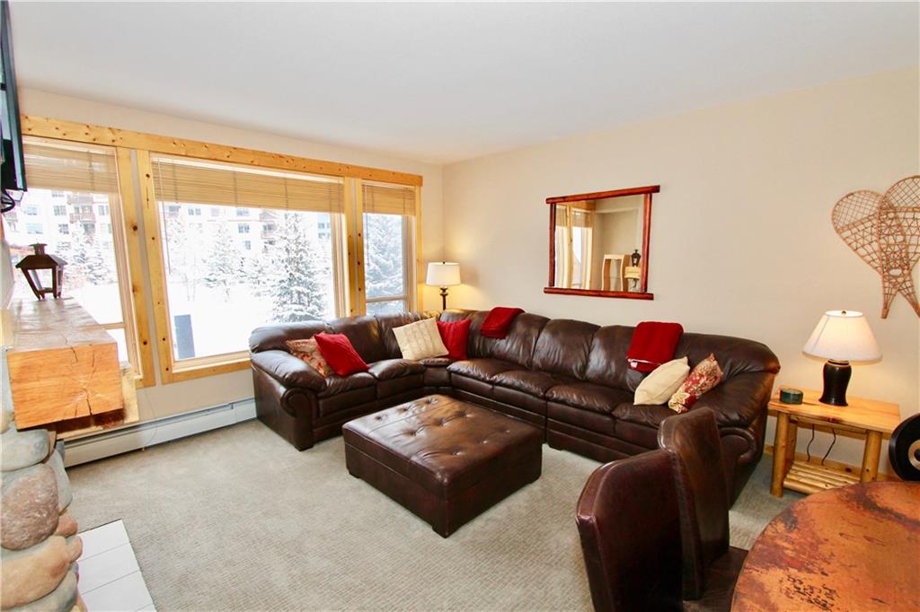172 Copper Circle, Unit 210 Copper Mountain, CO 80443 - Photo 10 of 25 a living room with furniture and a large window