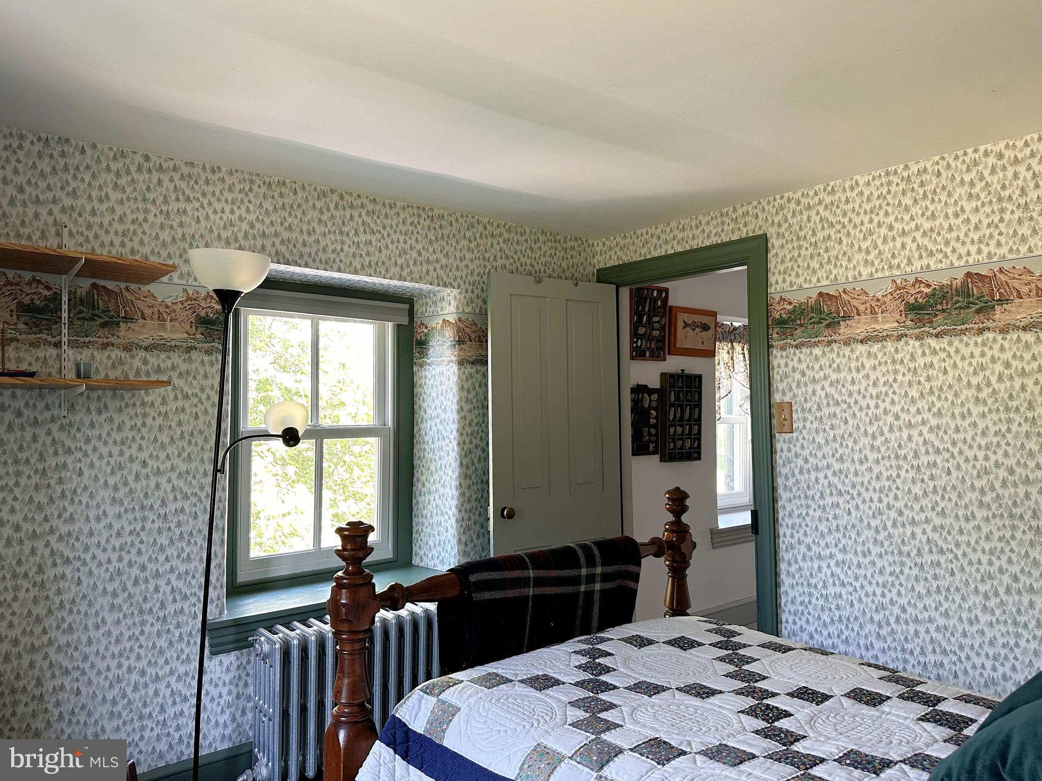 2382 Bergey Road Harleysville, PA 19438 - Photo 45 of 52 a bedroom with a bed and wooden floor