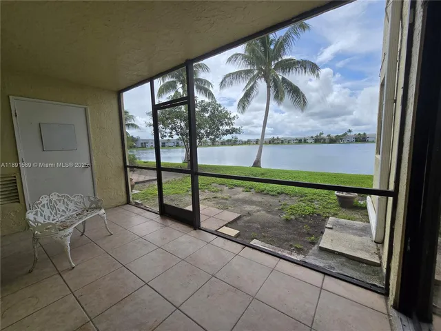 a view of a porch with a bench