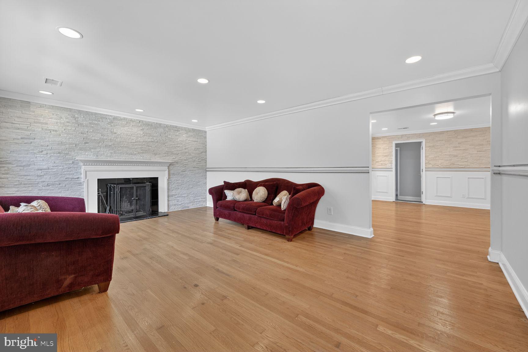 7205 Livingston Road Oxon Hill, MD 20745 - Photo 6 of 25 Spacious living area with elegant charm.