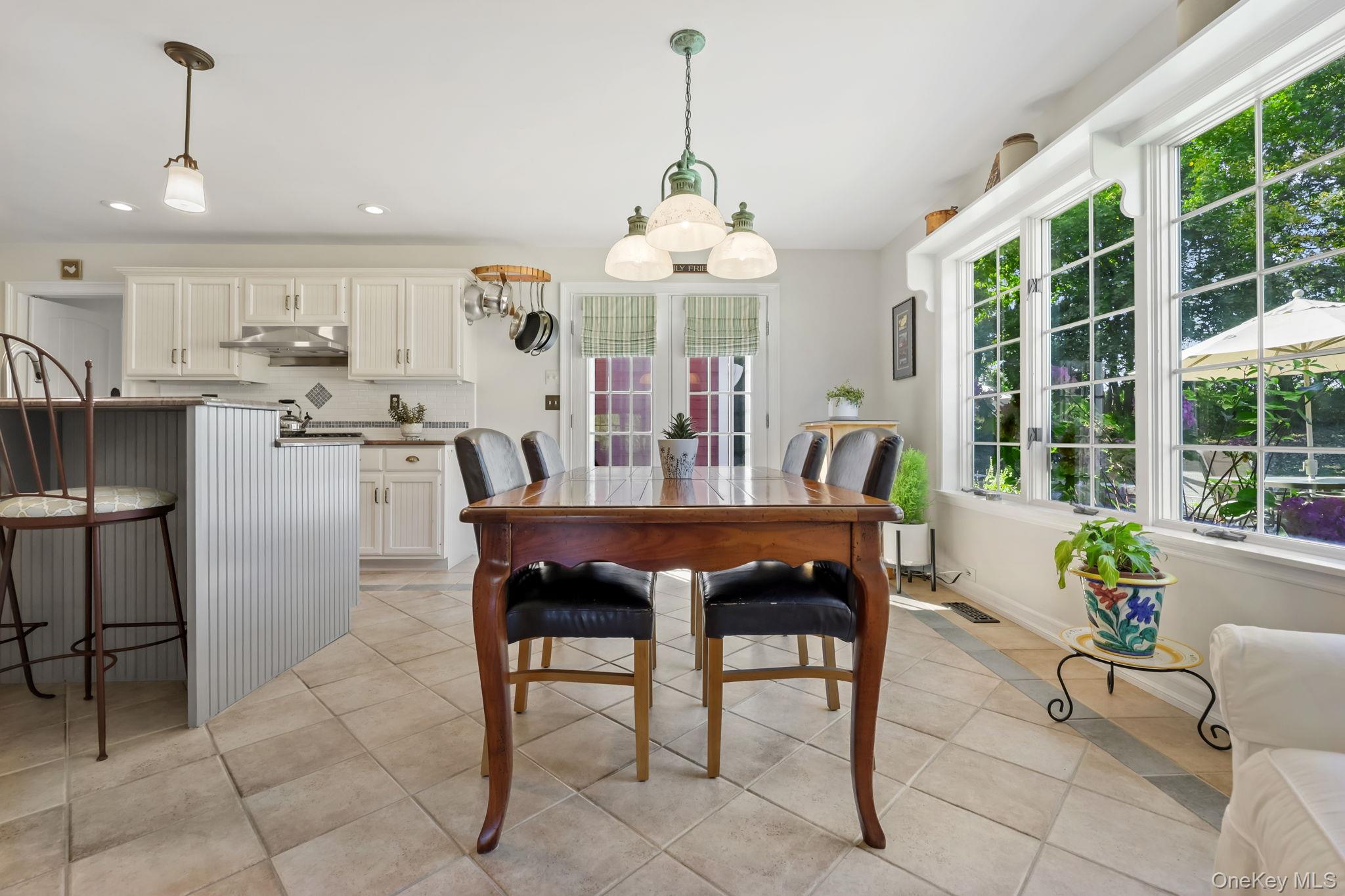 21 Adams Farm Road Katonah, NY 10536 - Photo 12 of 47 a view of a dining room with furniture window and outside view