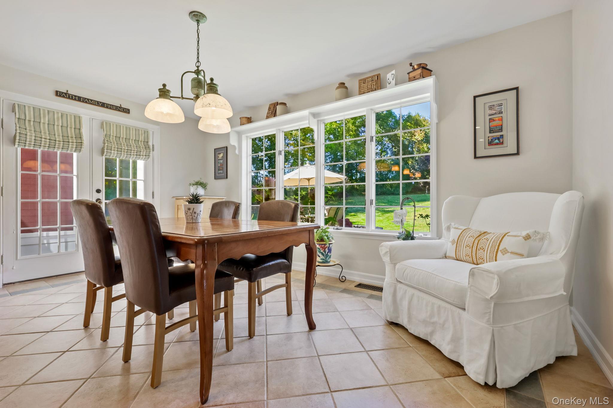 21 Adams Farm Road Katonah, NY 10536 - Photo 13 of 47 a view of a dining room with furniture wooden floor and chandelier