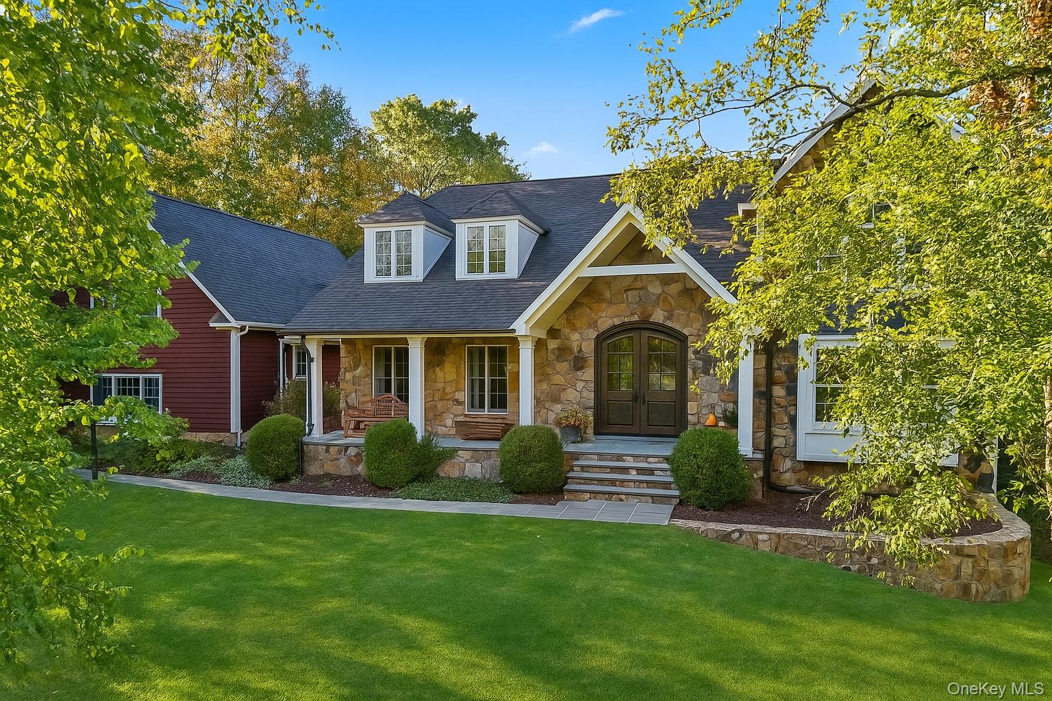 21 Adams Farm Road Katonah, NY 10536 - Photo 2 of 47 a front view of a house with garden