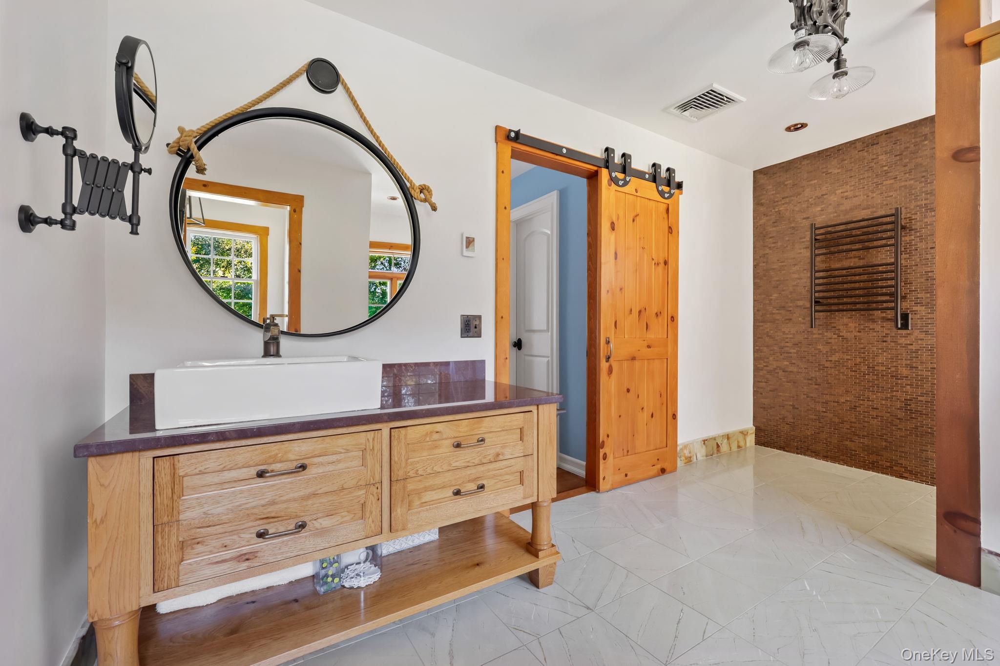 21 Adams Farm Road Katonah, NY 10536 - Photo 22 of 47 a front view of a mirror