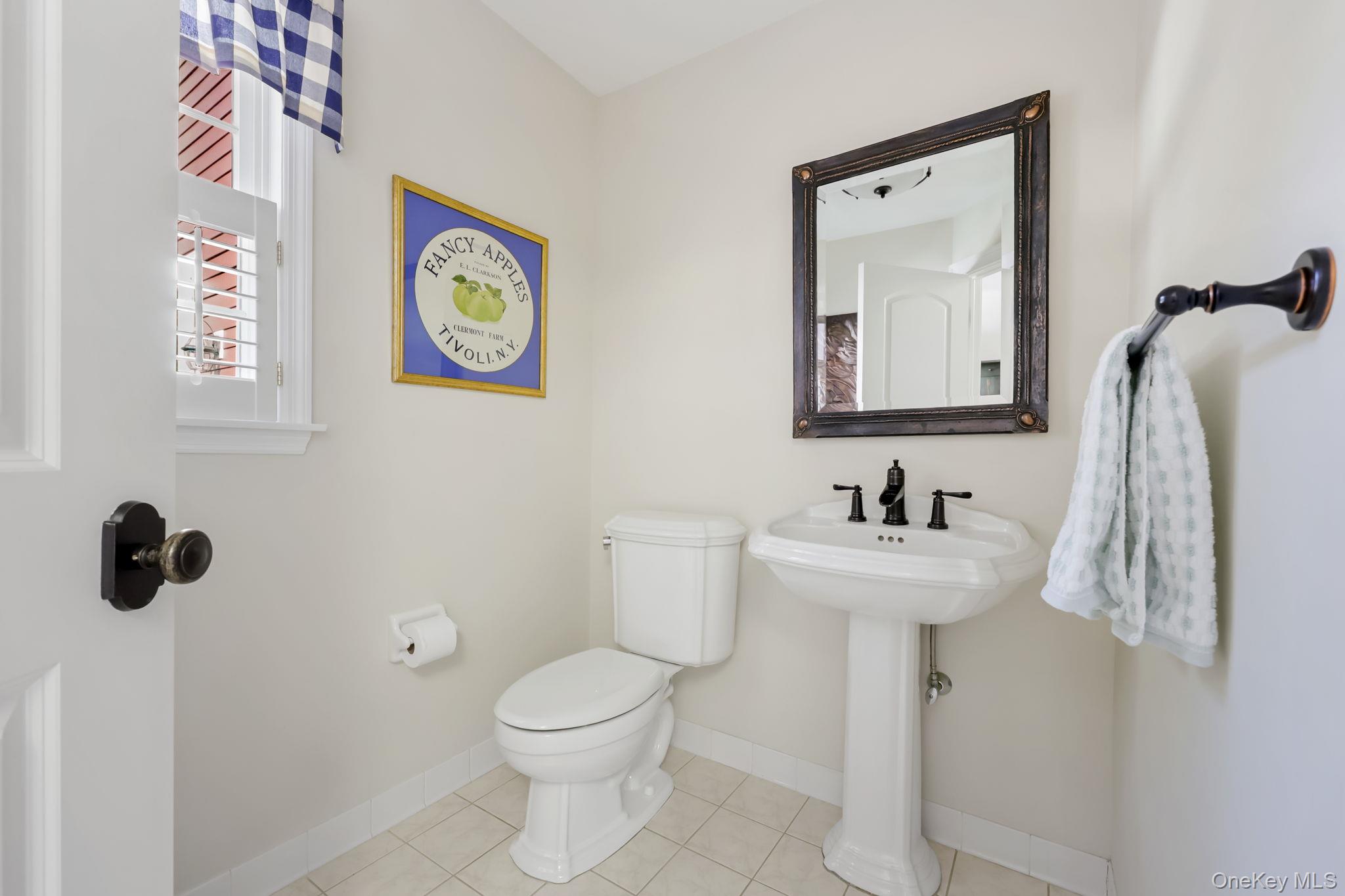 21 Adams Farm Road Katonah, NY 10536 - Photo 30 of 47 a bathroom with a toilet sink and mirror