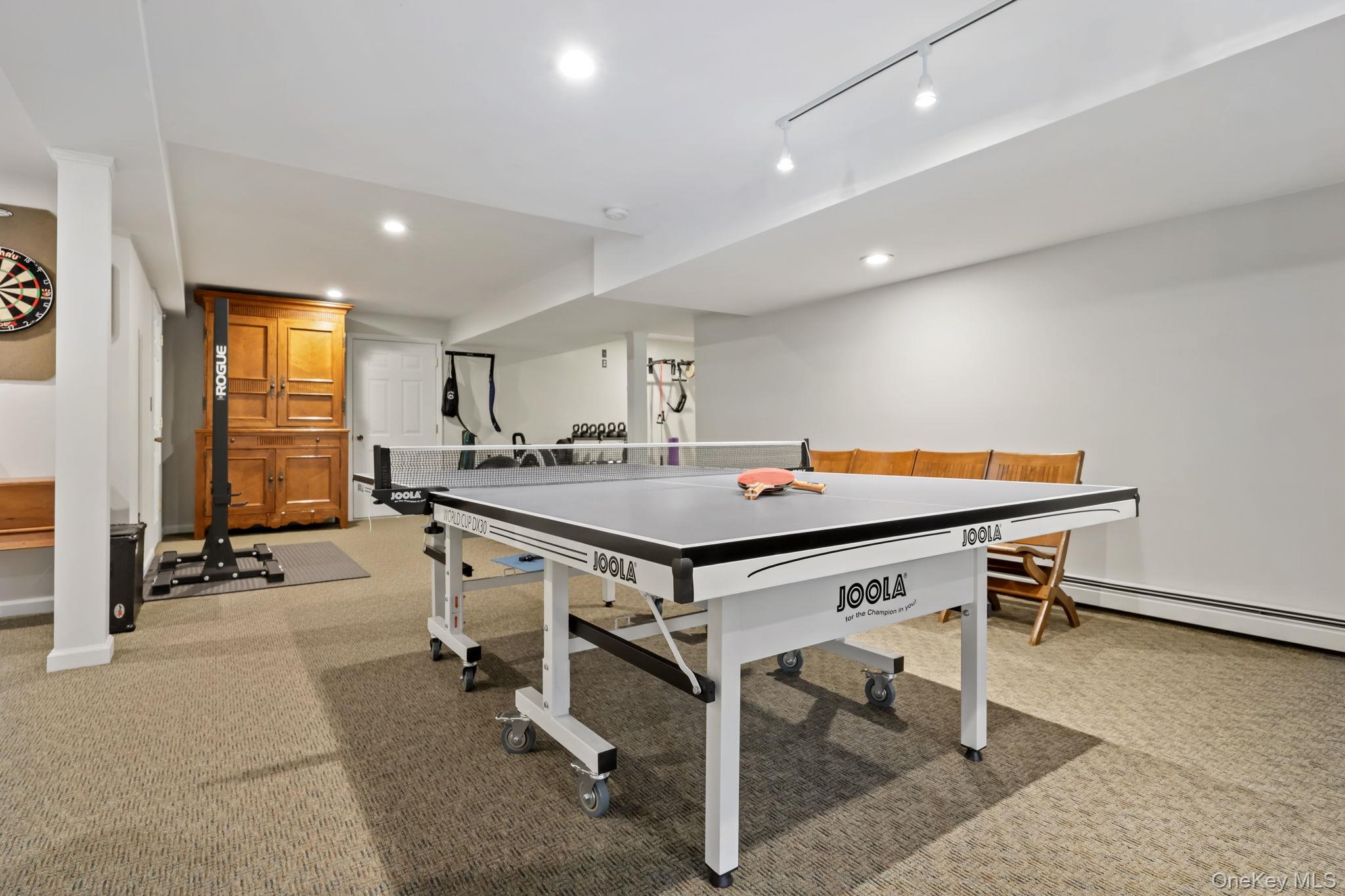 21 Adams Farm Road Katonah, NY 10536 - Photo 34 of 47 a room with table chairs and a table