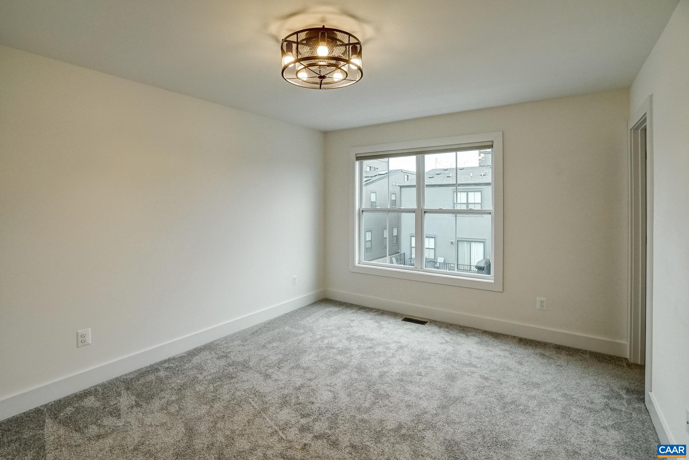 407 Fennel Road Crozet, VA 22932 - Photo 31 of 55 Second bedroom on the upper level features a private ensuite bathroom and walk in closet.