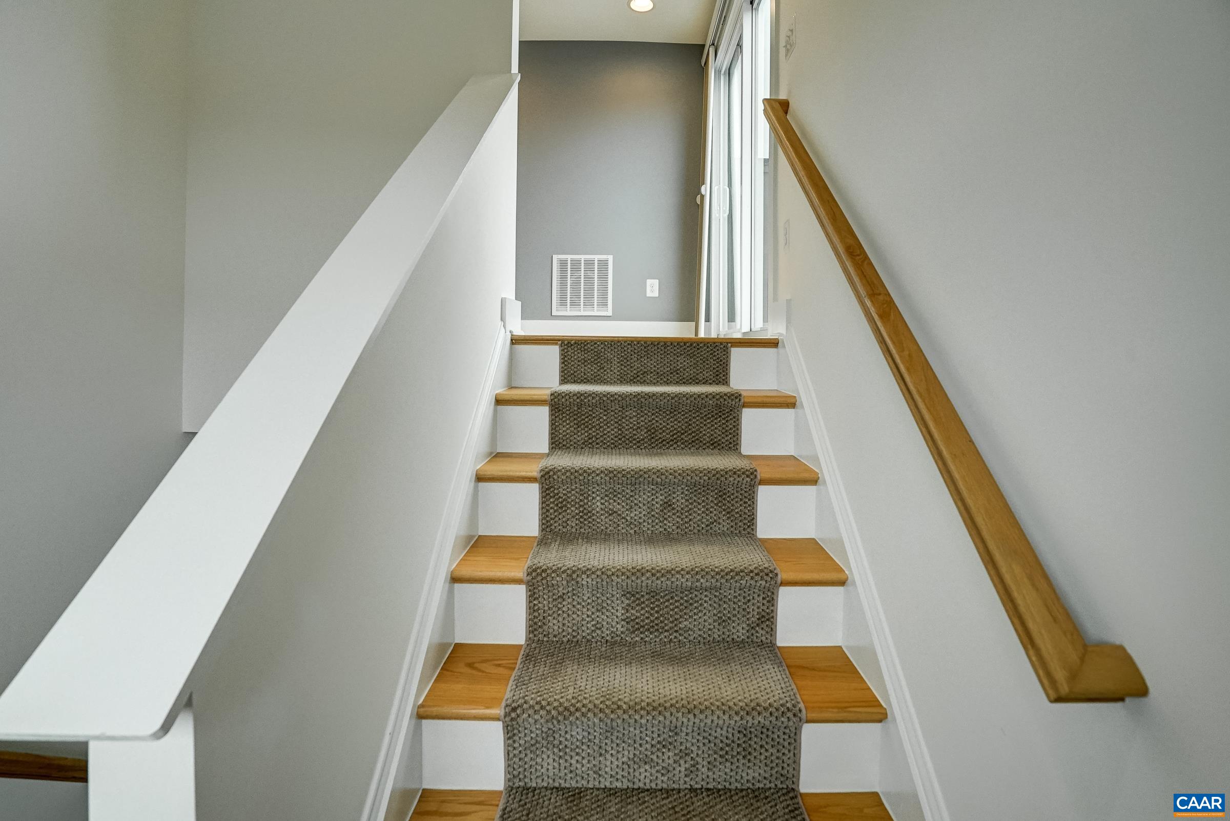 407 Fennel Road Crozet, VA 22932 - Photo 34 of 54 High-end carpet runner on the stairs.