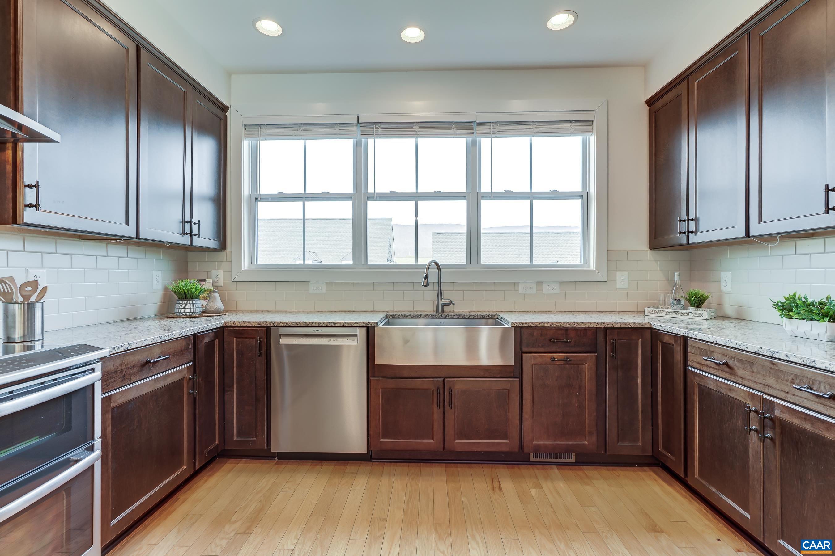 407 Fennel Road Crozet, VA 22932 - Photo 7 of 54 Upgraded stainless steel appliances include Bosch dishwasher and Samsung refrigerator.