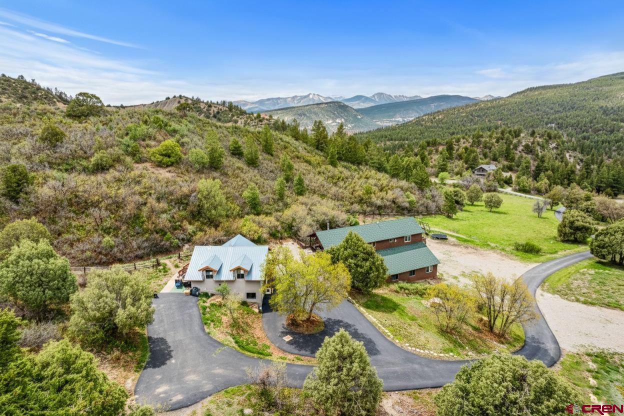 201 Ute Canyon Road Durango, CO 81301 - Photo 11 of 44 an aerial view of residential houses with outdoor space