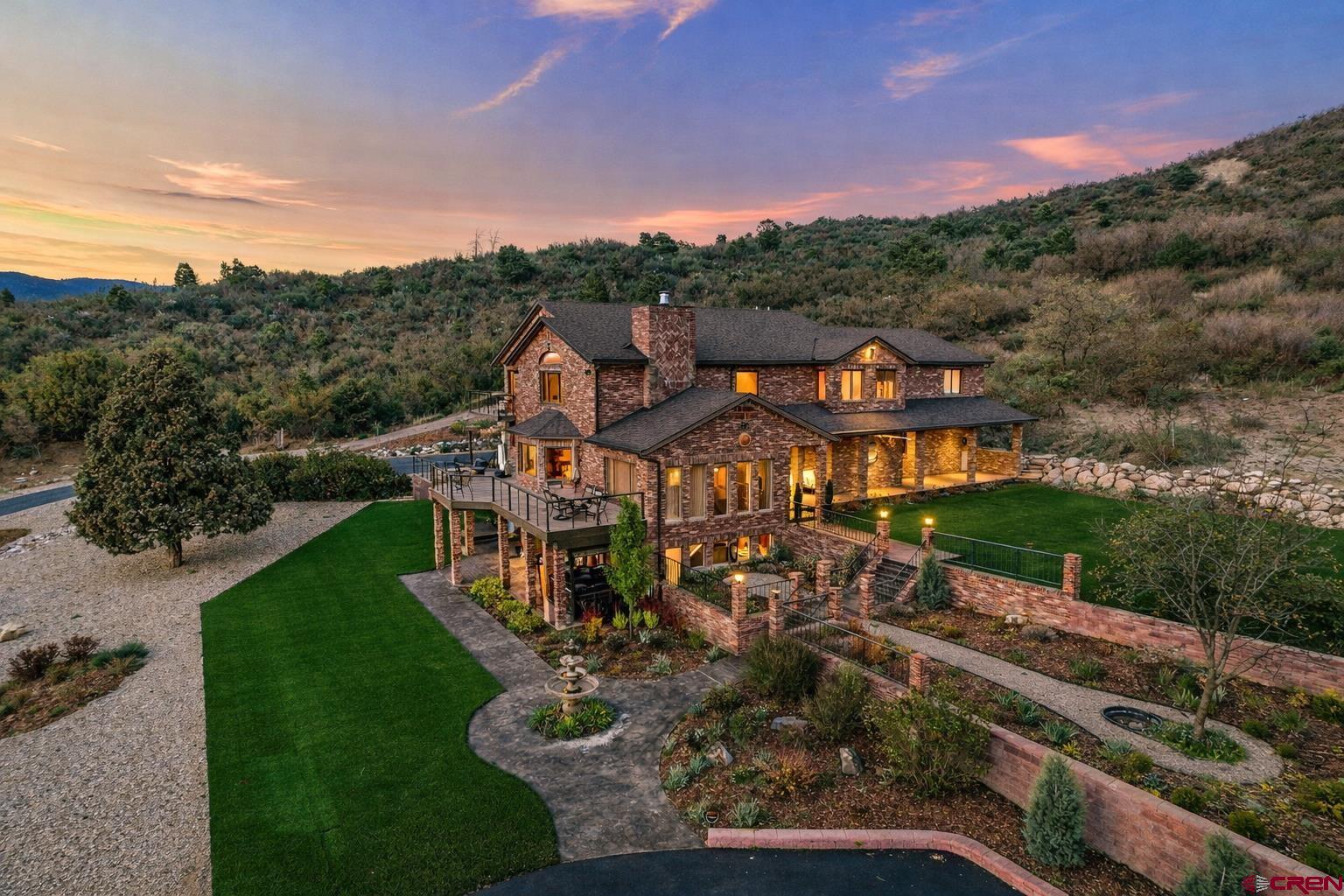201 Ute Canyon Road Durango, CO 81301 - Photo 12 of 44 a aerial view of a house with a big yard