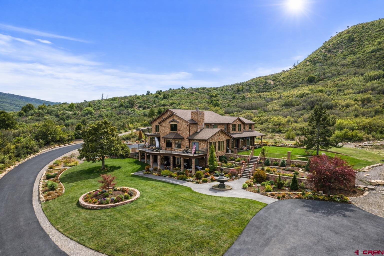 201 Ute Canyon Road Durango, CO 81301 - Photo 17 of 44 a view of a house with swimming pool and a yard