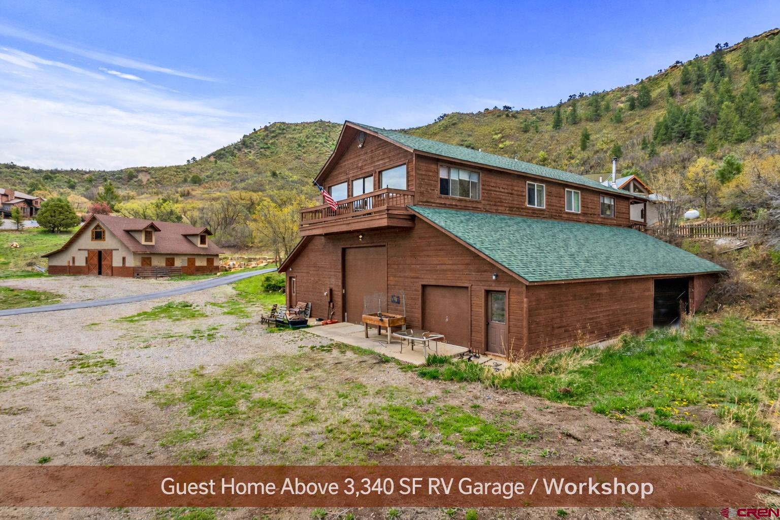 201 Ute Canyon Road Durango, CO 81301 - Photo 21 of 44 a view of a house with a yard