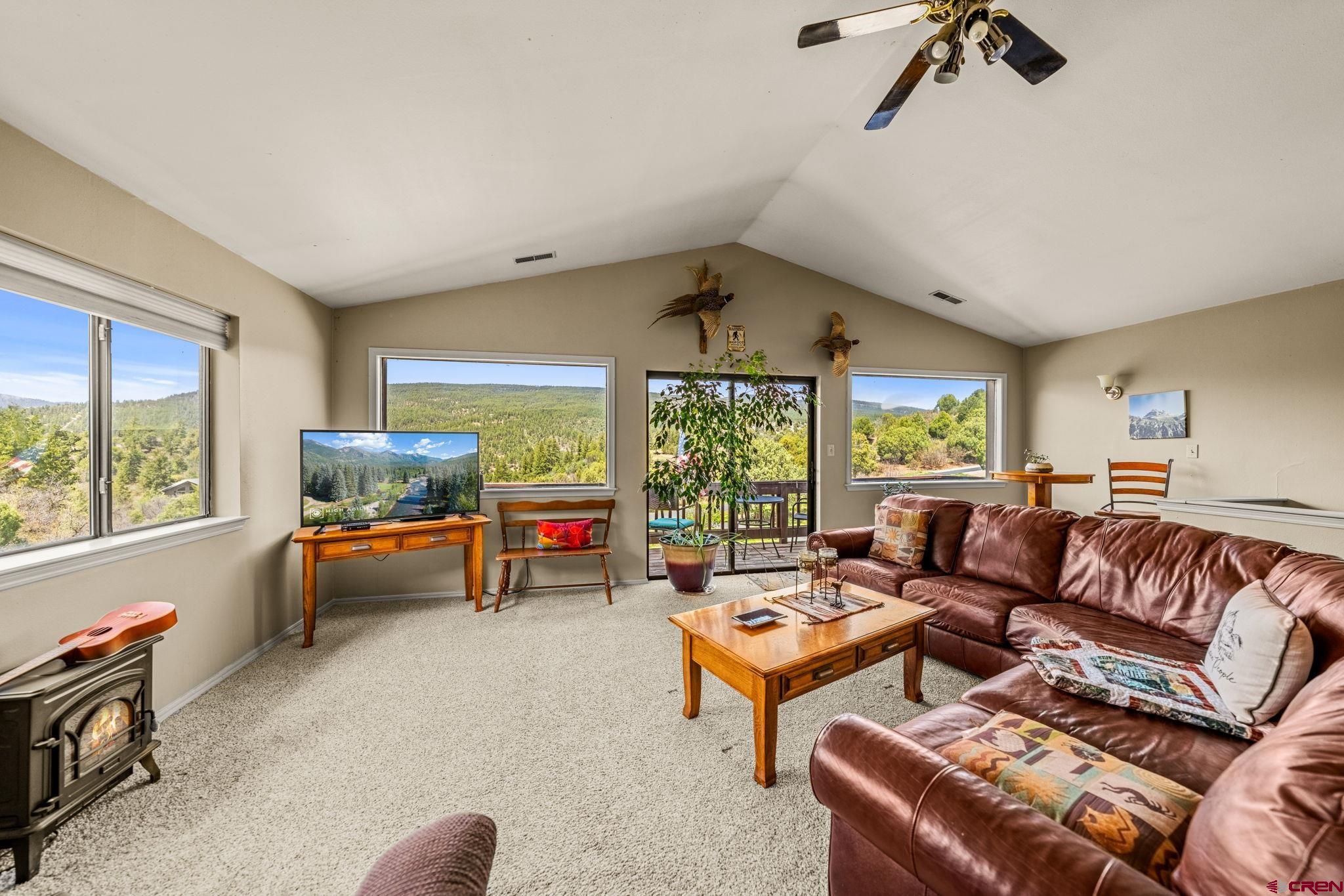 201 Ute Canyon Road Durango, CO 81301 - Photo 22 of 44 a living room with furniture and a large window
