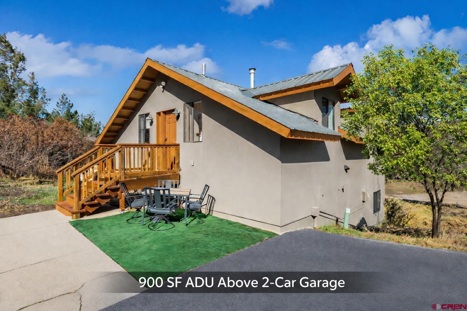 201 Ute Canyon Road Durango, CO 81301 - Photo 25 of 44 a view of a house with a yard