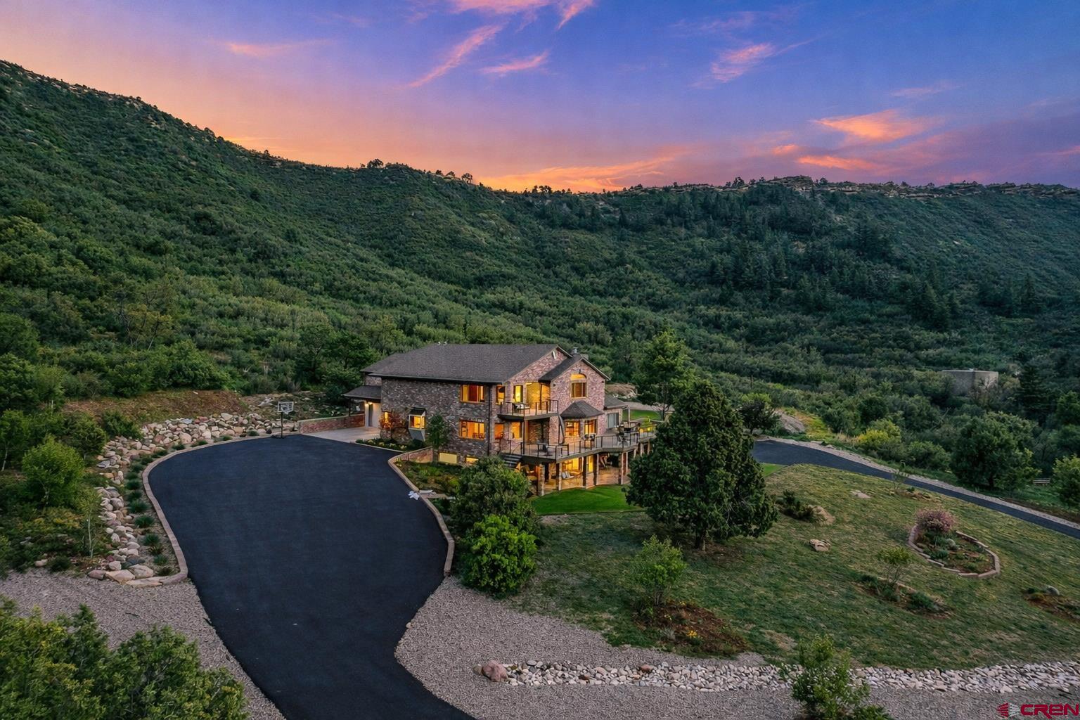 201 Ute Canyon Road Durango, CO 81301 - Photo 35 of 44 a view of a garden with a mountain in the background