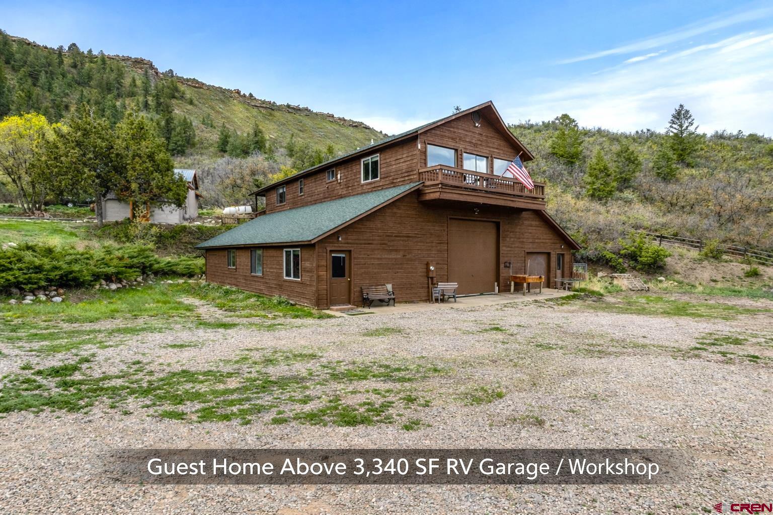 201 Ute Canyon Road Durango, CO 81301 - Photo 4 of 44 a house with green field