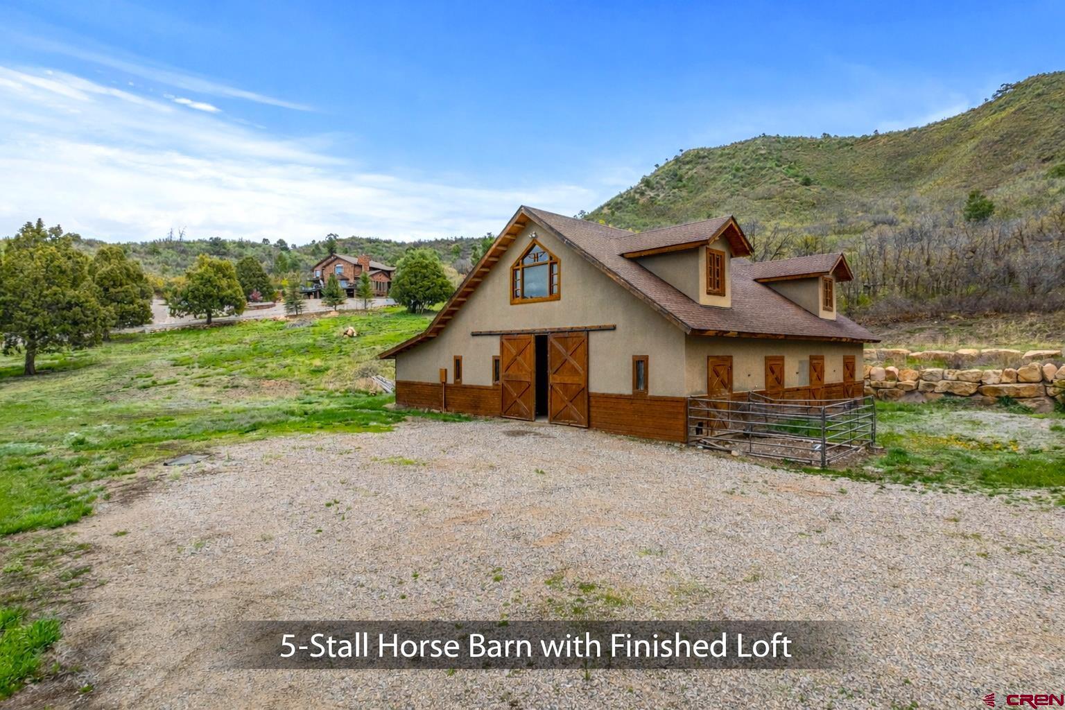 201 Ute Canyon Road Durango, CO 81301 - Photo 5 of 44 a view of a house with a big yard plants and large trees
