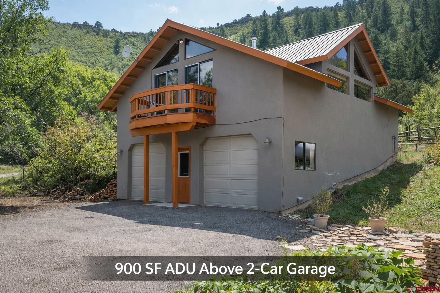 201 Ute Canyon Road Durango, CO 81301 - Photo 6 of 44 a view of a house with a yard