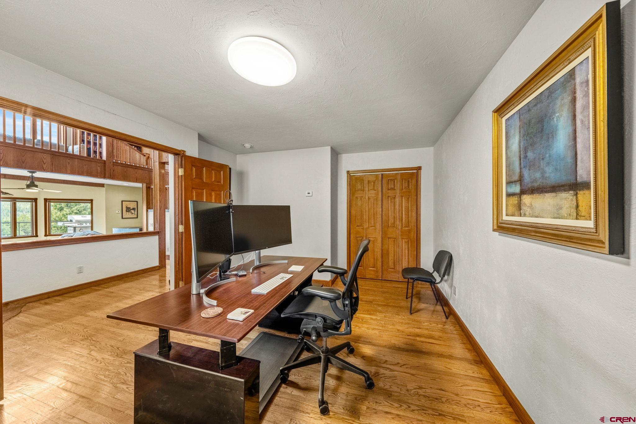 201 Ute Canyon Road Durango, CO 81301 - Photo 10 of 44 a view of a workspace with furniture and a window