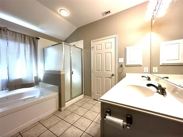 a bathroom with a sink and a bathtub