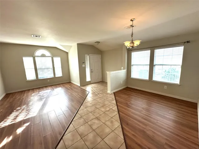 a view of an empty room and window