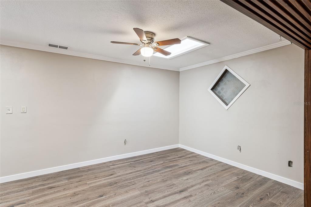 219 Bennett Street Winter Springs, FL 32708 - Photo 16 of 26 wooden floor in an empty room