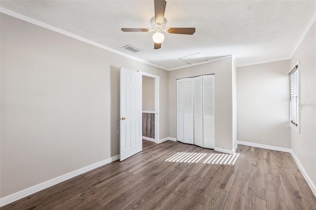 219 Bennett Street Winter Springs, FL 32708 - Photo 21 of 26 wooden floor in an empty room with a window