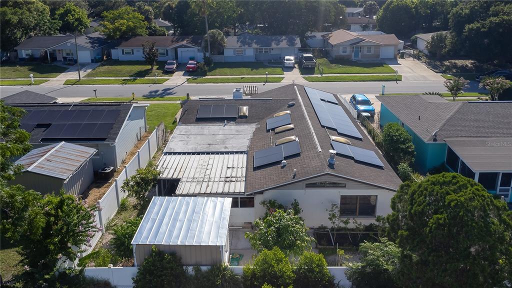 219 Bennett Street Winter Springs, FL 32708 - Photo 25 of 26 an aerial view of a house with garden space and swimming pool
