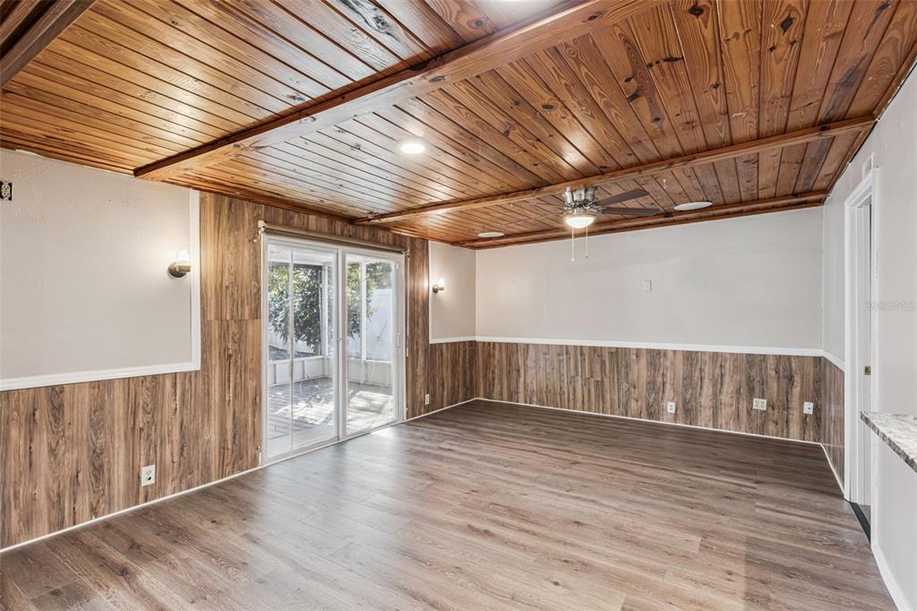 219 Bennett Street Winter Springs, FL 32708 - Photo 6 of 26 a view of an empty room with wooden floor