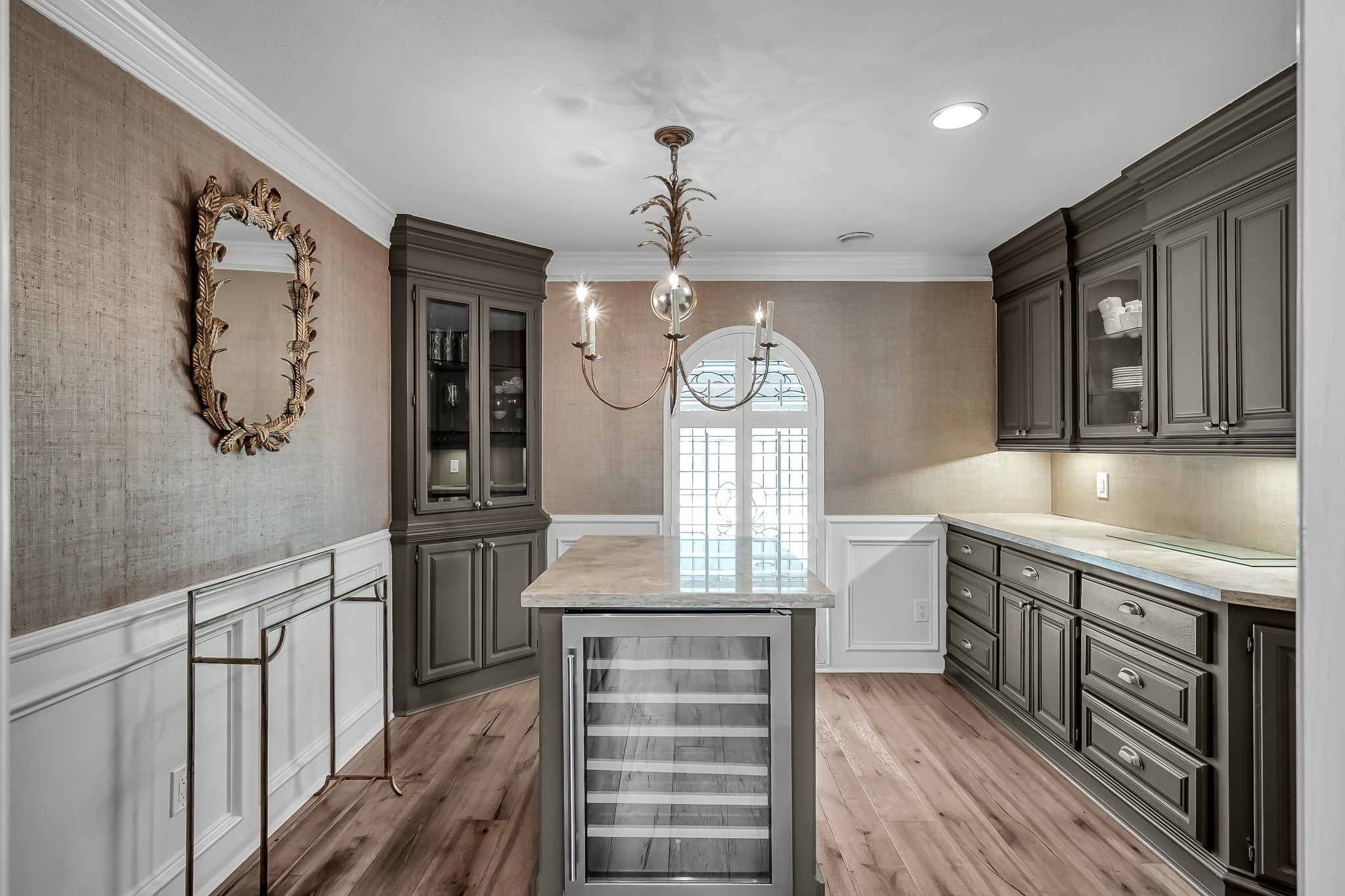 3272 Teas Nursery Road Conroe, TX 77304 - Photo 12 of 50 a bathroom with a sink a vanity and a large mirror
