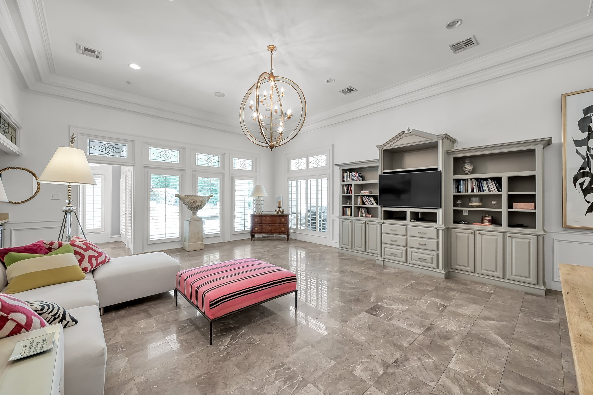 3272 Teas Nursery Road Conroe, TX 77304 - Photo 14 of 50 a spacious bedroom with a bed a chandelier and a large window