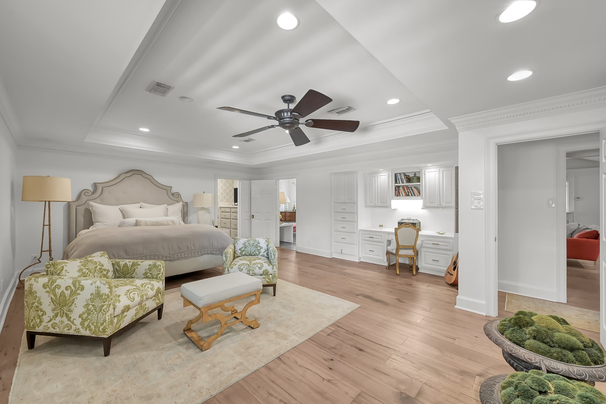 3272 Teas Nursery Road Conroe, TX 77304 - Photo 16 of 50 a bedroom with a bed and wooden floor