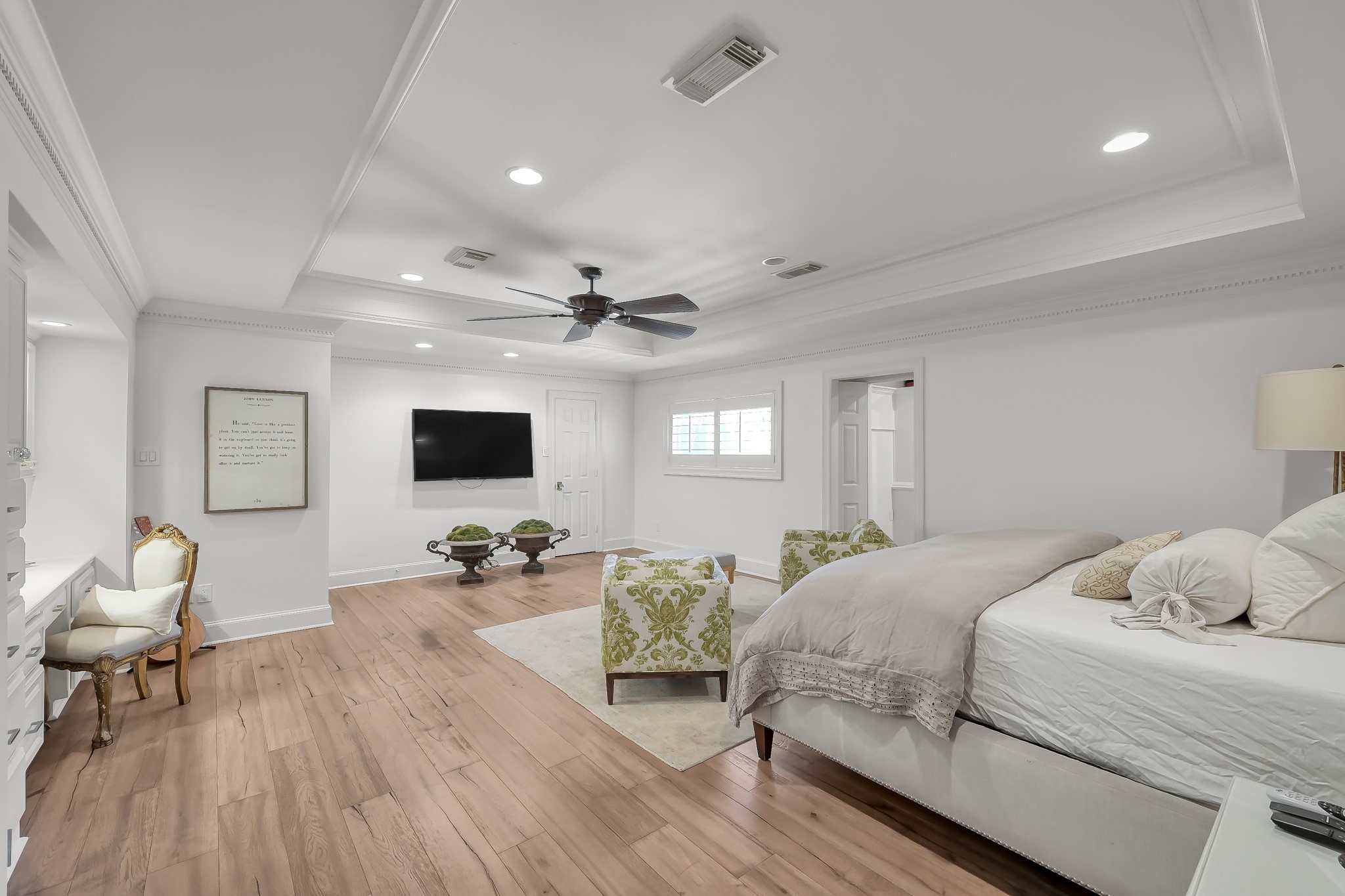 3272 Teas Nursery Road Conroe, TX 77304 - Photo 17 of 50 a bedroom with a bed and wooden floor