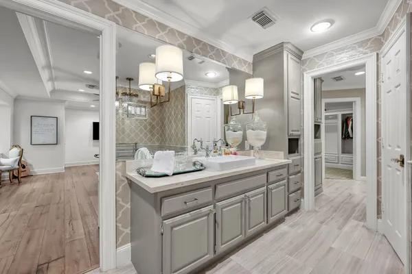 a bathroom with a sink double vanity and shower