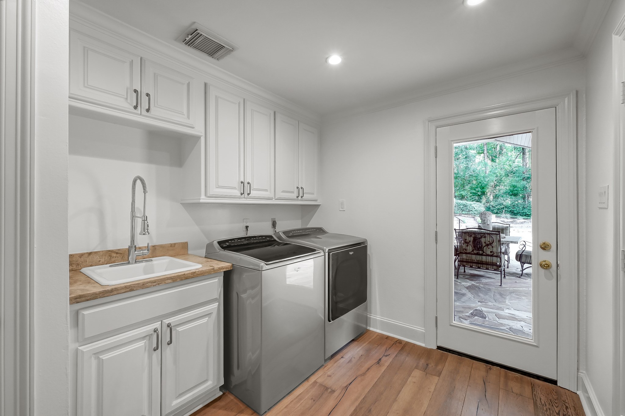 3272 Teas Nursery Road Conroe, TX 77304 - Photo 28 of 50 a kitchen with stainless steel appliances granite countertop a stove a sink and a refrigerator