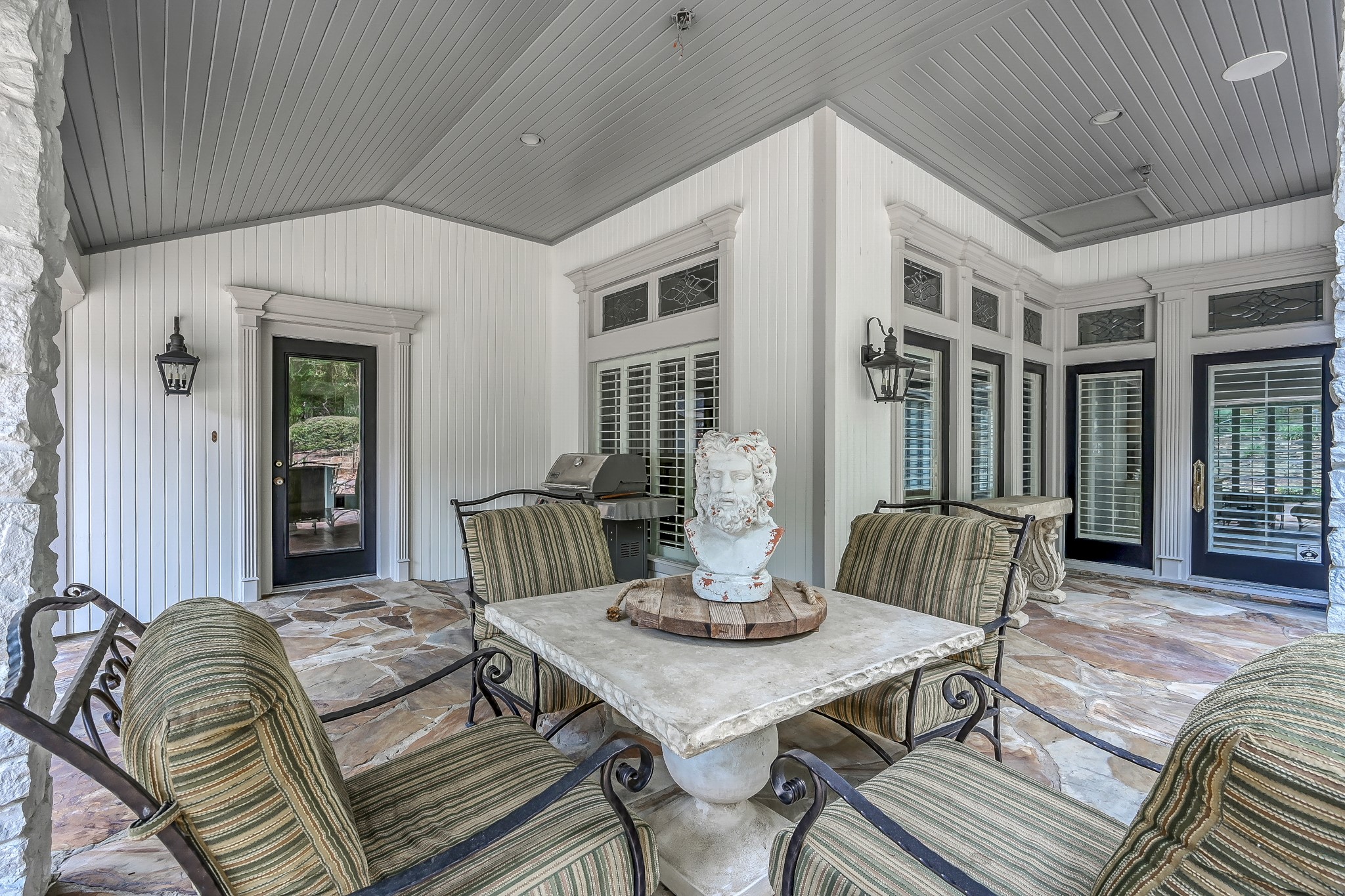 3272 Teas Nursery Road Conroe, TX 77304 - Photo 29 of 50 a view of a patio with a table and chairs